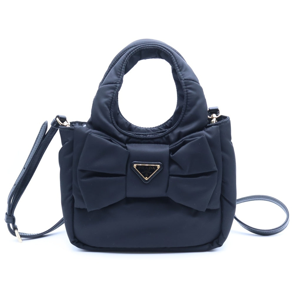 PRADA(プラダ) Re-Nylon パデット リボン ミニバッグ トライアングルロゴ ブラック テスート ゴールド金具 1BA359 レディース