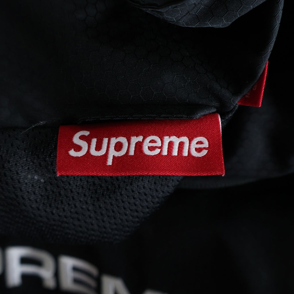 SUPREME(シュプリーム) 24AW Reflective Piping Pullover リフレクティブ パイピング プルオーバー ハーフジップジャケット ブラック
