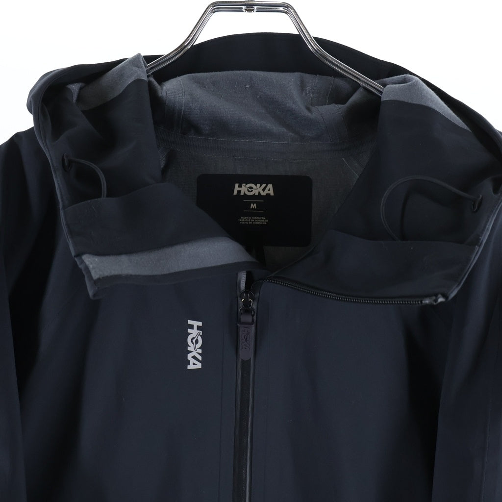 HOKA ONE ONE(ホカオネオネ) トランスポートジャケット ジップアップナイロンジャケット 1170250 ブラック