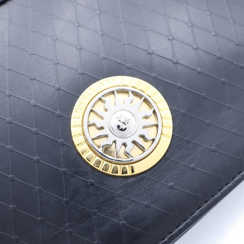 VERSACE(ヴェルサーチ) 太陽モチーフ ロゴプレート レザー ハンド クラッチ セカンドバッグ ブラック ゴールド金具 レディース