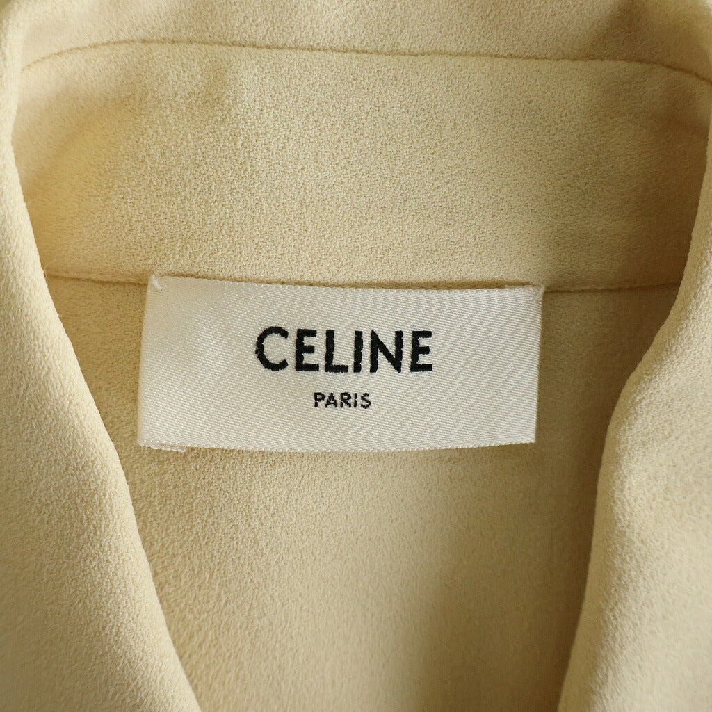 CELINE(セリーヌ) トリオンフボタン フリル ブラウス トップス 長袖 ラージボウ付き リボンタイ アイボリー 2B395865C レディース