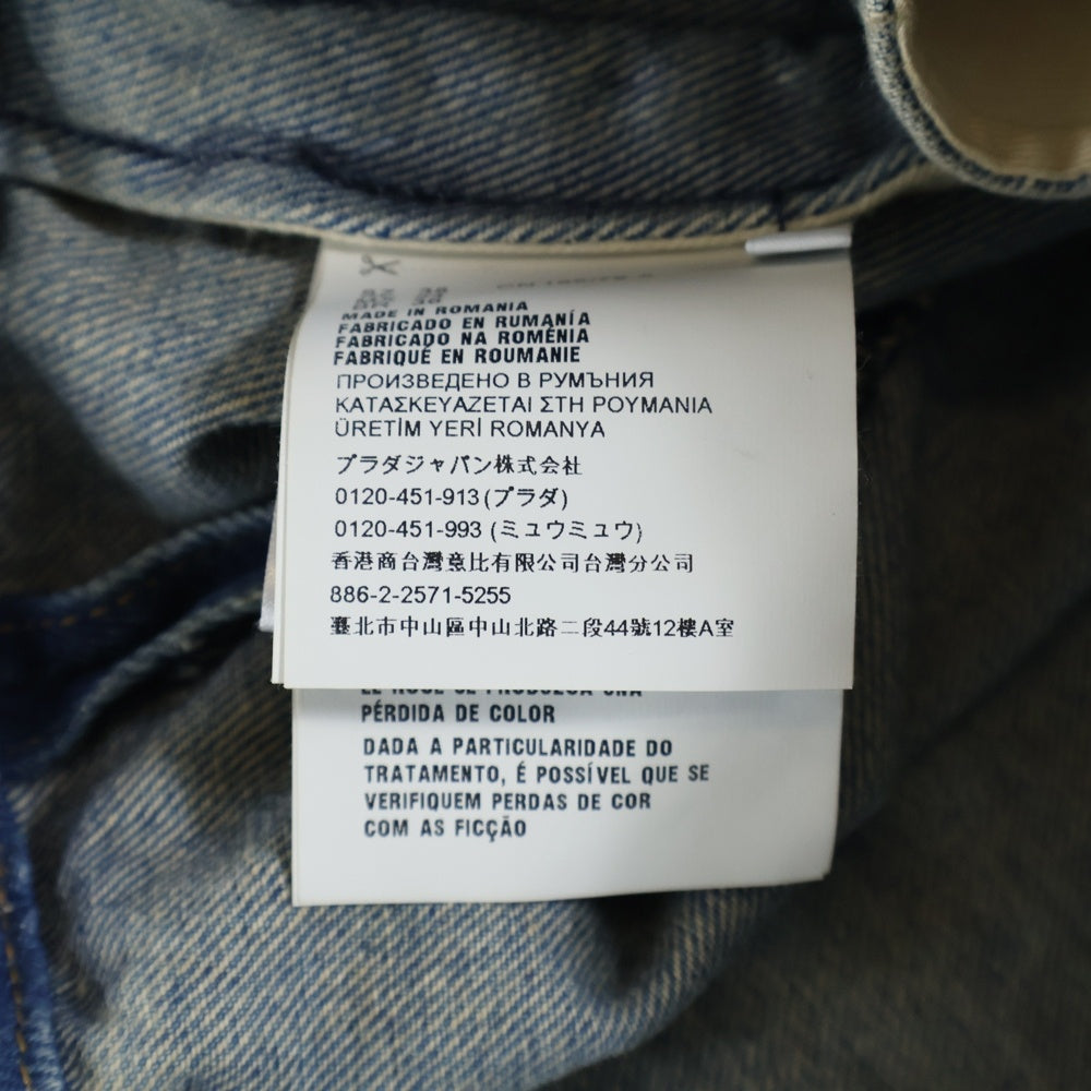 PRADA(プラダ) 23SS トライアングルロゴプレート ヴィンテージ加工 クロップド ショート オーガニック デニム ジップアップ トラッカージャケット インディゴ GFB279 レディース