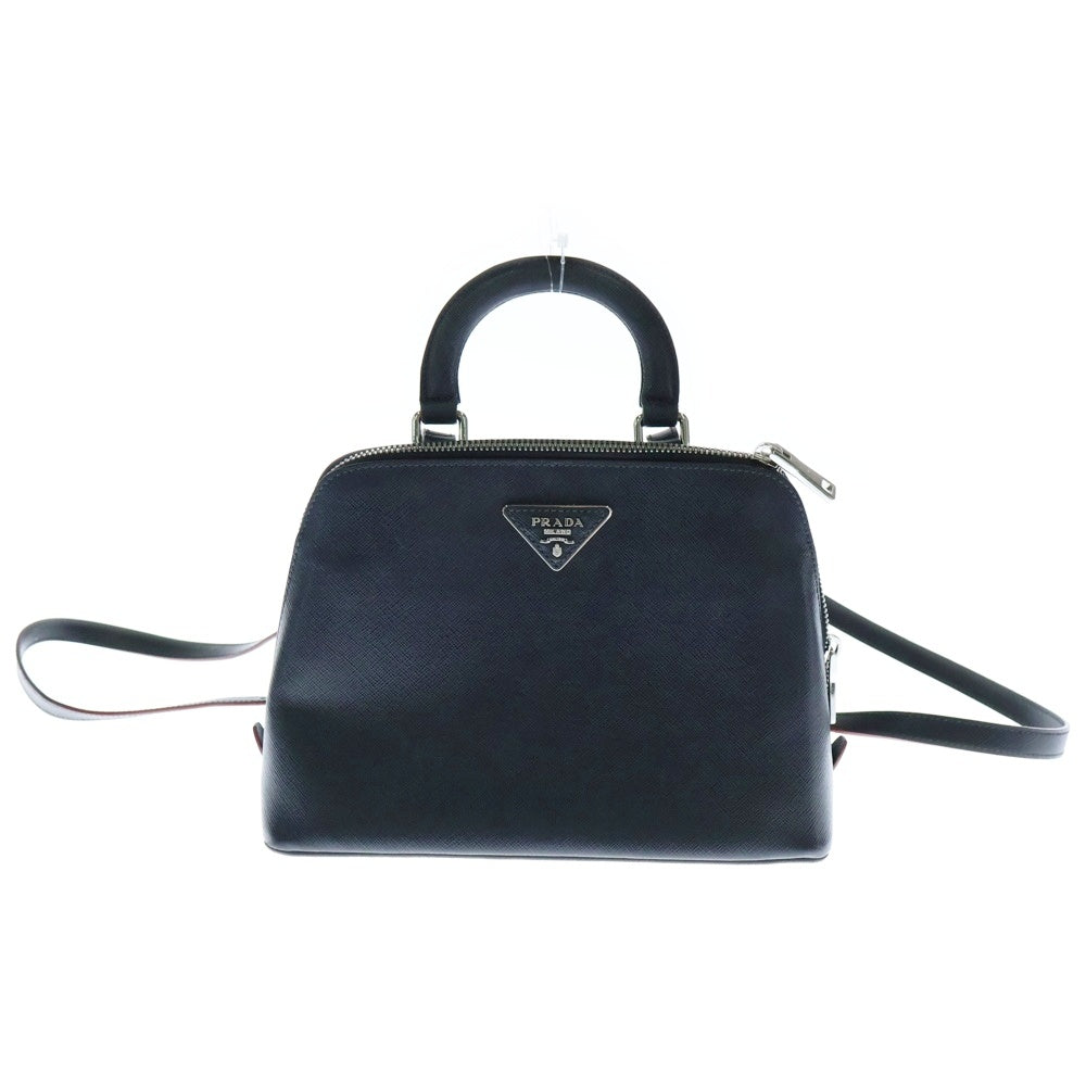 PRADA(プラダ) サフィアーノ 2wayバッグ ミニリュックサック バックパック ハンドバッグ ネイビー×レッド シルバー金具 レザー トライアングルロゴプレート 1BZ003