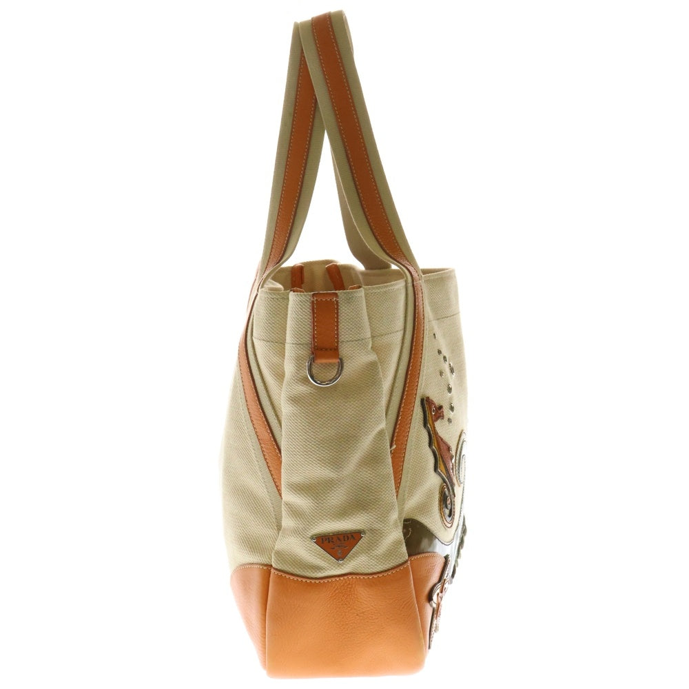 PRADA(プラダ) タツノオトシゴモチーフ スタッズ付 レザー切替 キャンパストートバッグ ベージュ×オレンジ BR2971