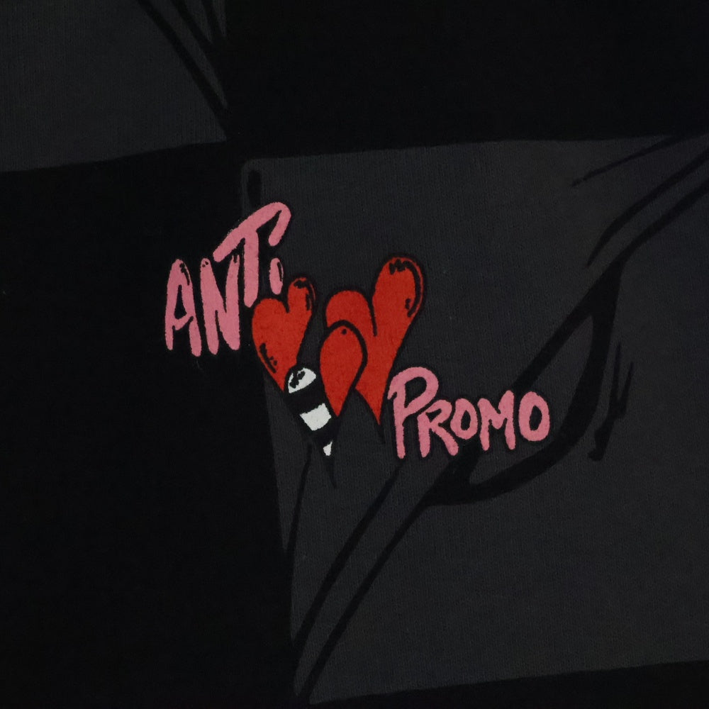 ANTI PROMO(アンチプロモ) 99EYES SWATPANTS MATTY BOY プリントスウェットロングパンツ ブラック