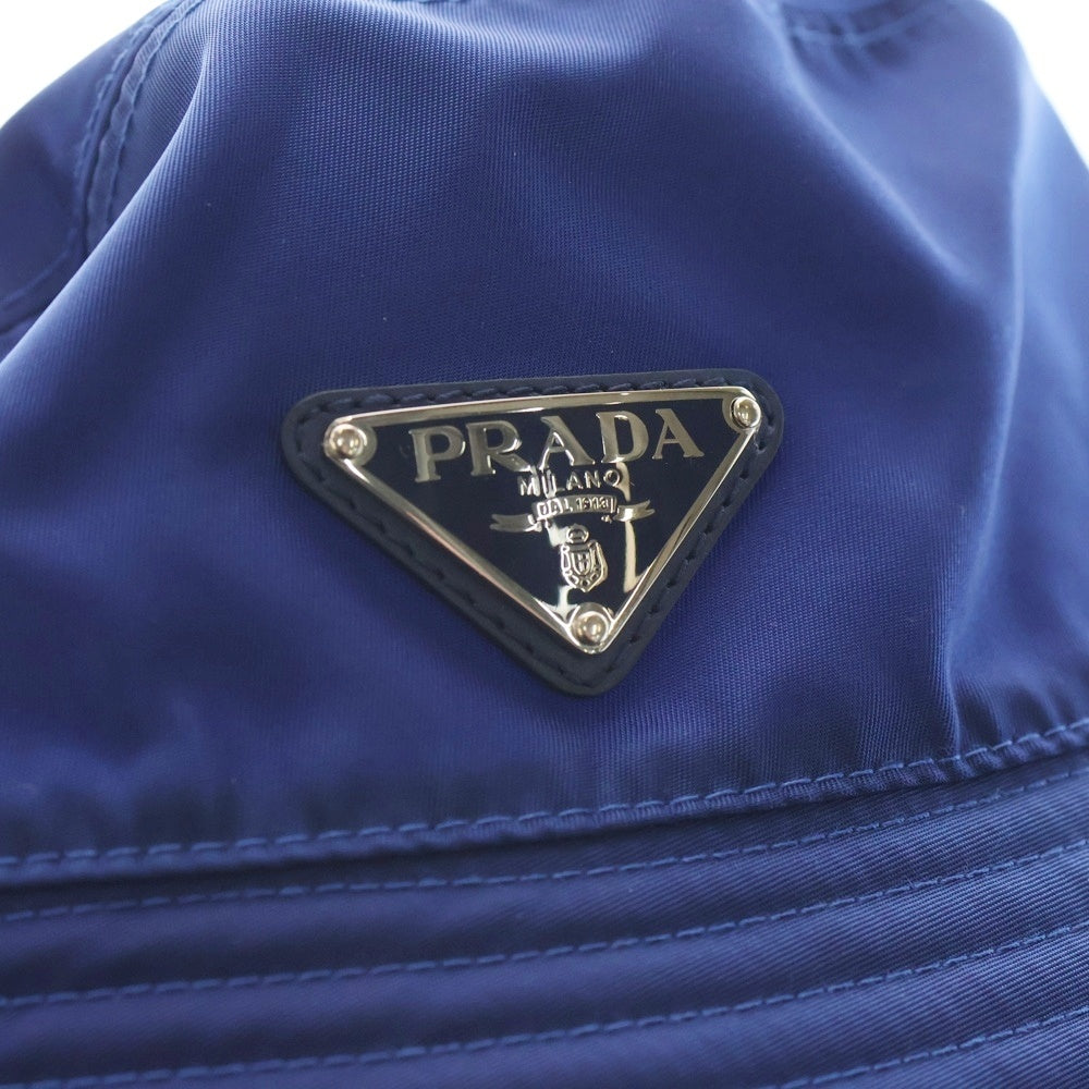 PRADA(プラダ) トライアングルプレートロゴ リバーシブルナイロンバケットハット 帽子 ブルー レディース