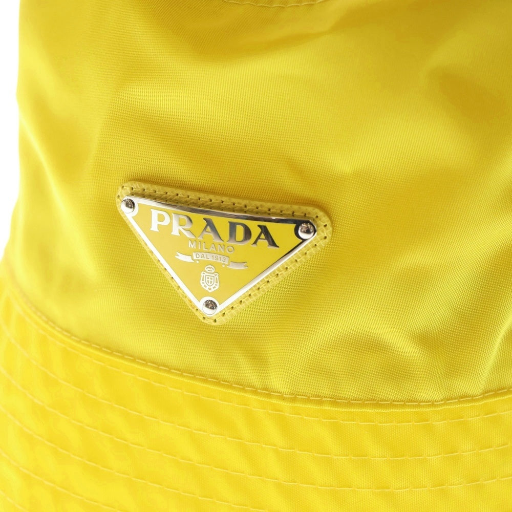 PRADA(プラダ) トライアングルプレートロゴ ナイロンバケットハット 帽子 イエロー レディース