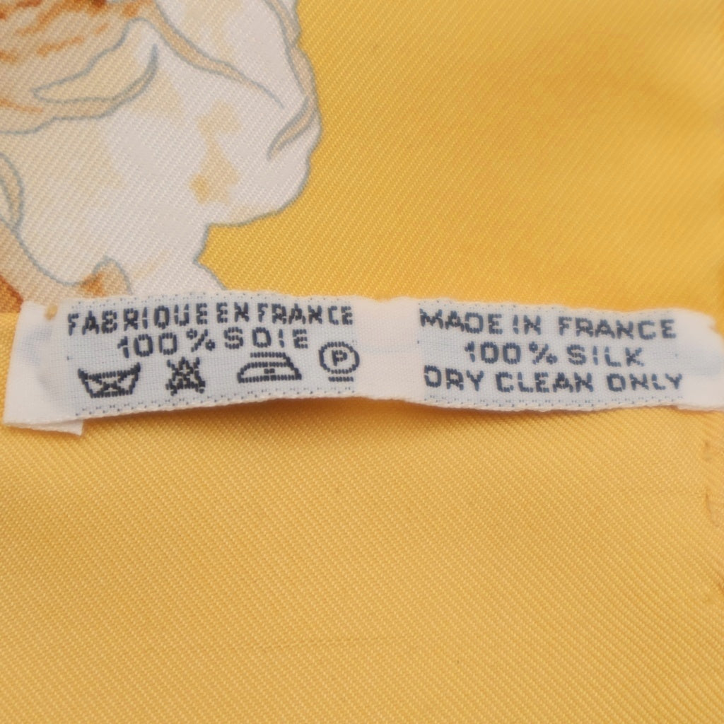 HERMES(エルメス) カレ90 TURBANS DES REINES 王女のターバン シルク スカーフ イエロー レディース