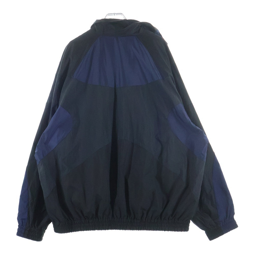 FACETASM(ファセッタズム) 23SS NYLON PATCHWORK JACKET パッチワーク フロントロゴ刺繍 ジップアップ ナイロンジャケット ブラック/ネイビー MKS-JK-M09