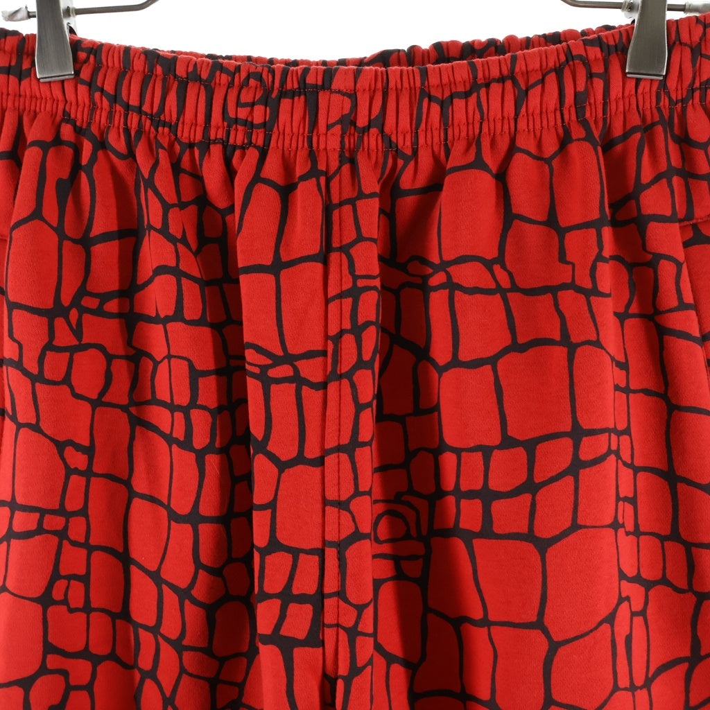 always do what you should do(オールウェイズドゥ ワットユーシュドドゥ) スパイダー 総柄 イージー スウェット パンツ レッド