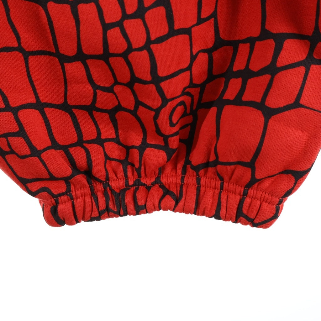 always do what you should do(オールウェイズドゥ ワットユーシュドドゥ) スパイダー 総柄 イージー スウェット パンツ レッド