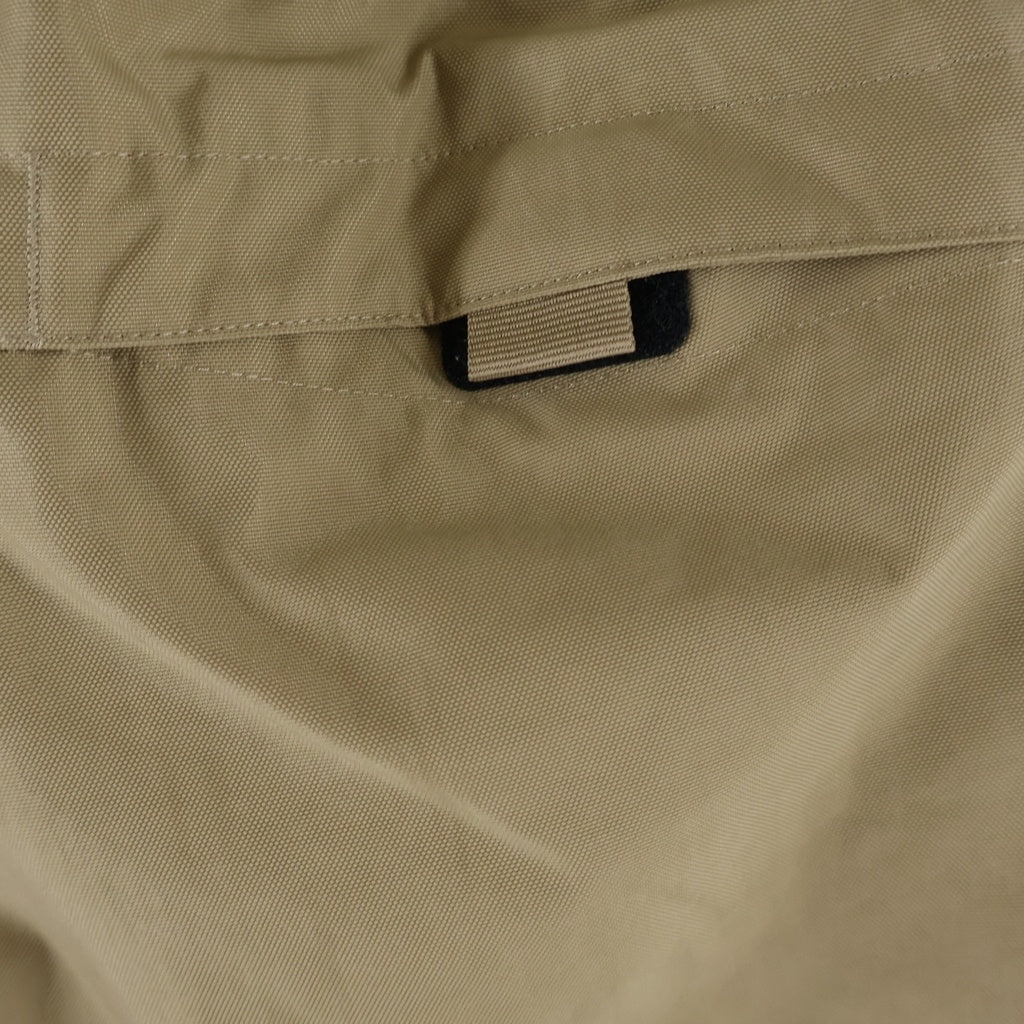STUSSY(ステューシー) ×NIKE Utility Pant Pine Nut ロゴ 刺繍 ナイロン サイド ライン ジップ パンツ ベージュ