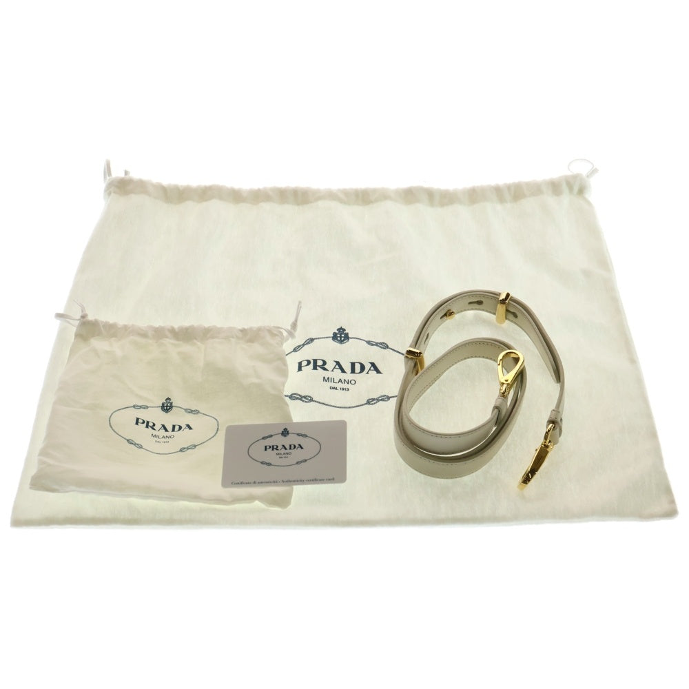 PRADA(プラダ) シアリング ショルダーバッグ ポーチ ホワイト ゴールド金具 シープファー 1BH192