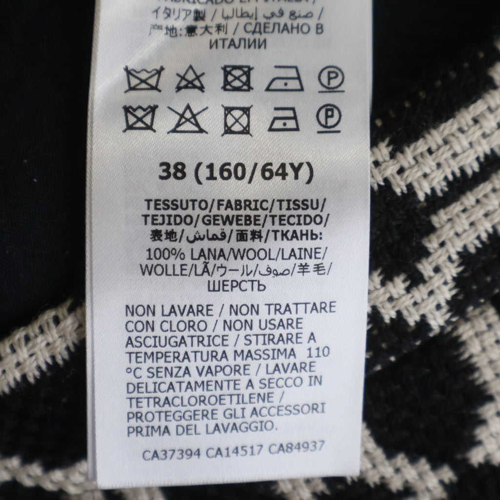 GUCCI(グッチ) 総柄ジャガード モノクローム オプティカルツイード ニット ミディアム スカート ブラック レディース 643332