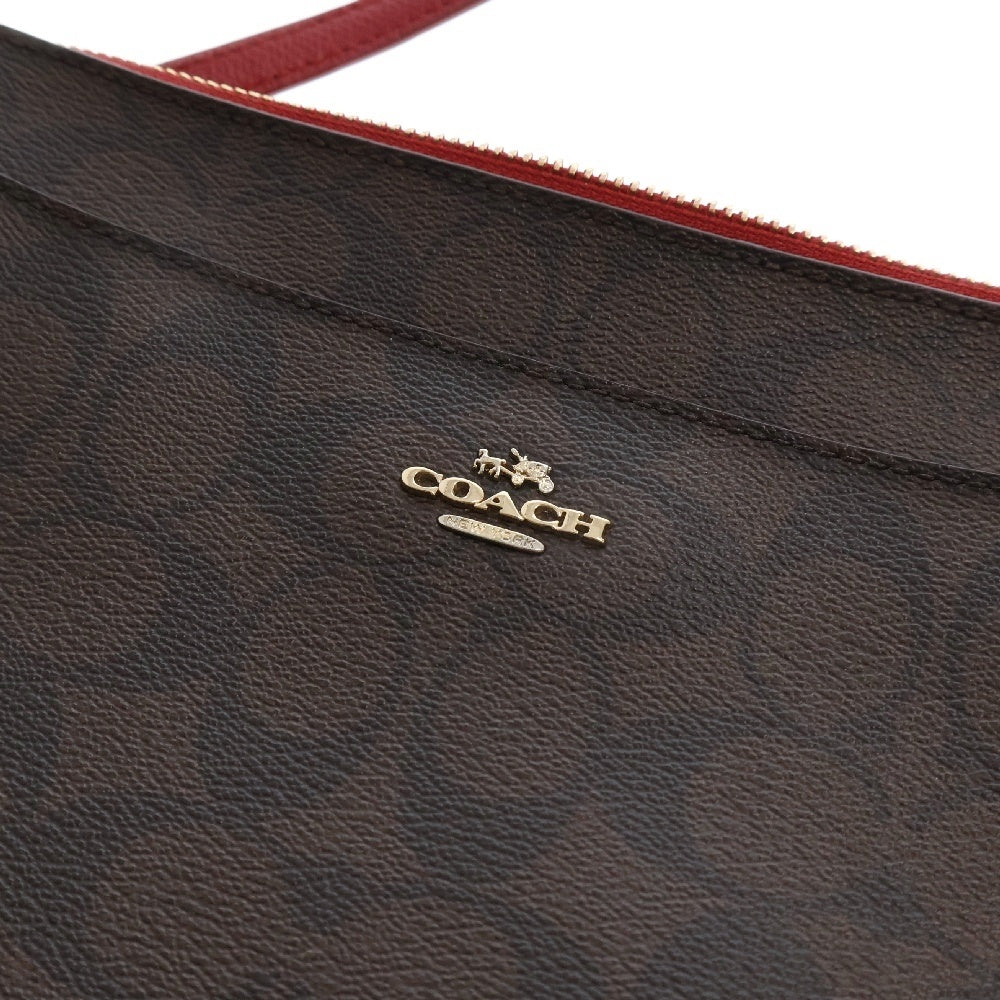 COACH(コーチ) ロゴプレート シグネチャー ショルダーバッグ 総柄 レディース ブラウン/レッド