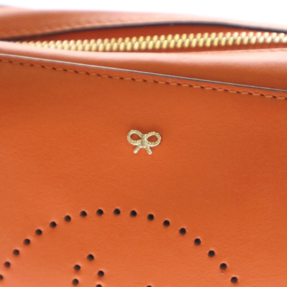 Anya Hindmarch(アニヤハインドマーチ) パンチング スマイリーデザイン ショルダーバッグ レザー オレンジ レディース