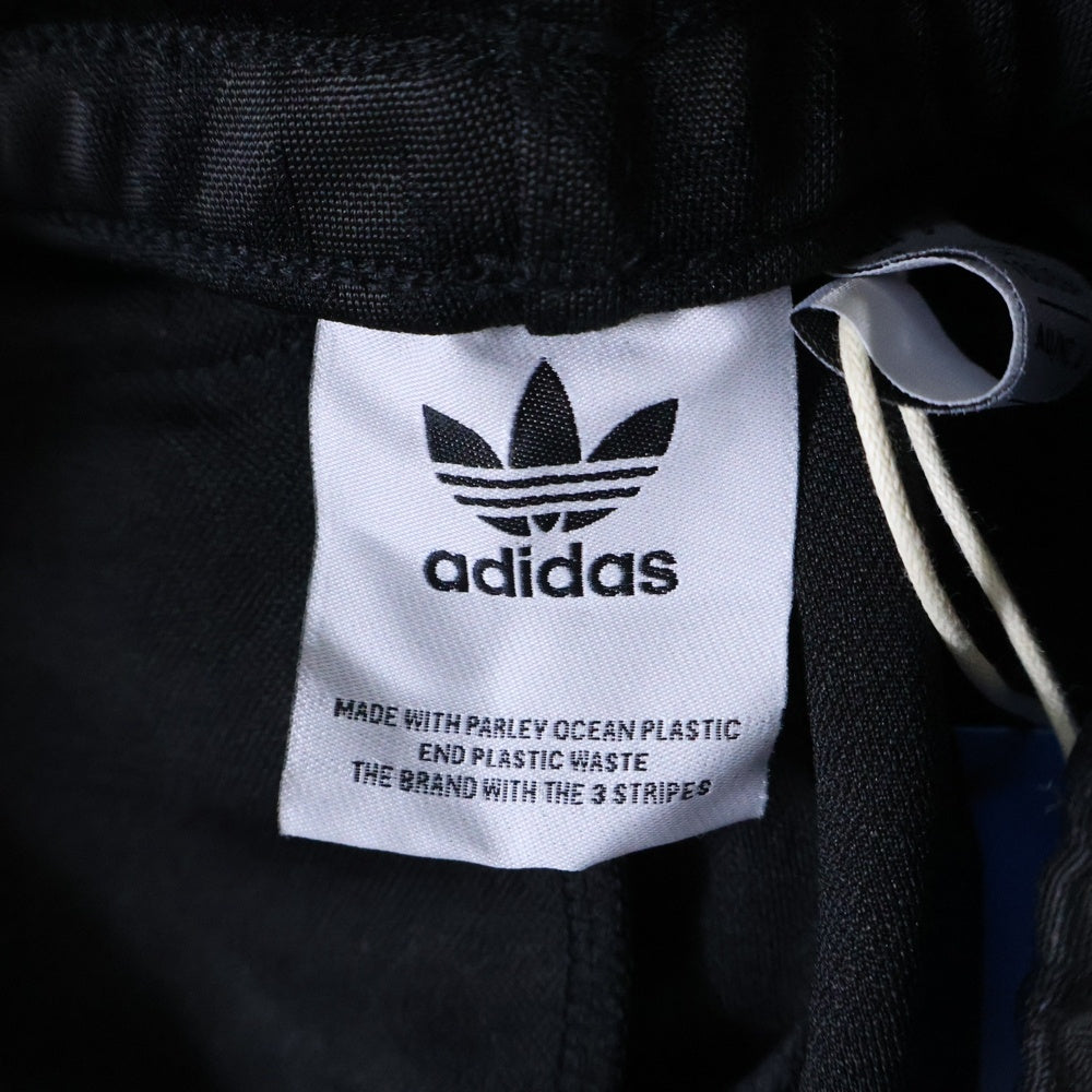 adidas Originals(アディダスオリジナルス) Monogram Track Pants モノグラム 総柄プリント トラックパンツ ブラック IP6985