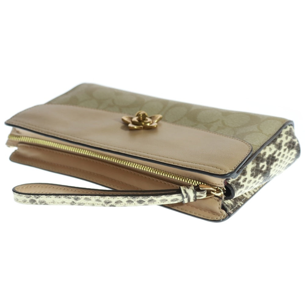 COACH(コーチ) シグネチャー切替 フラワー ターンロック クラッチ バッグ ベージュ レディース A1977-F72997