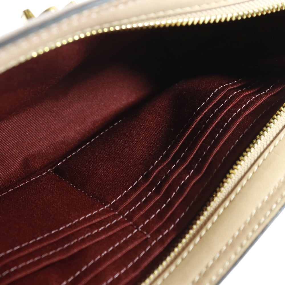 COACH(コーチ) シグネチャー切替 フラワー ターンロック クラッチ バッグ ベージュ レディース A1977-F72997