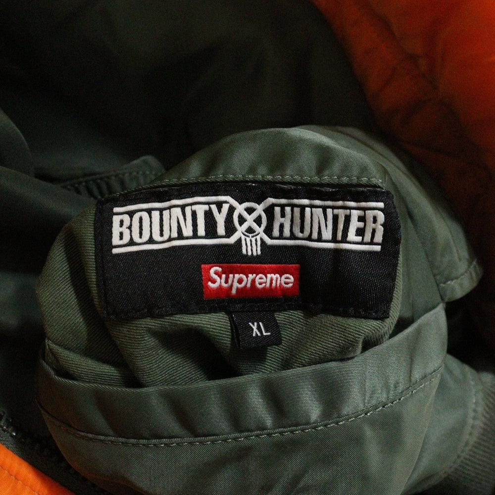 SUPREME(シュプリーム) 23AW ×Bounty Hunter Ma-1 Jacket バウンティーハンター エムエーワン スカル リバーシブルフライトジャケット カーキ/オレンジ