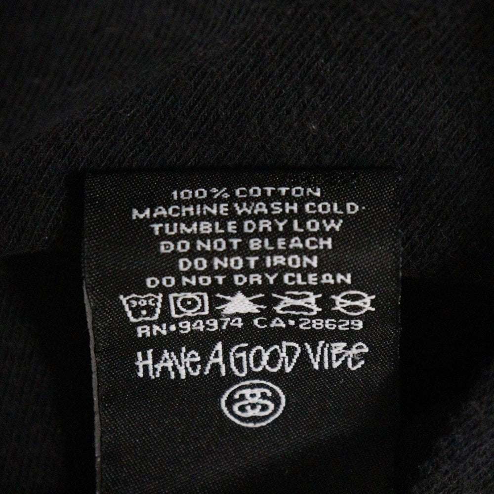 STUSSY(ステューシー) DJ STRETCH ARMSTRONG ストレッチ アームストロング 両面プリント クルーネック カットソー 半袖Tシャツ ブラック