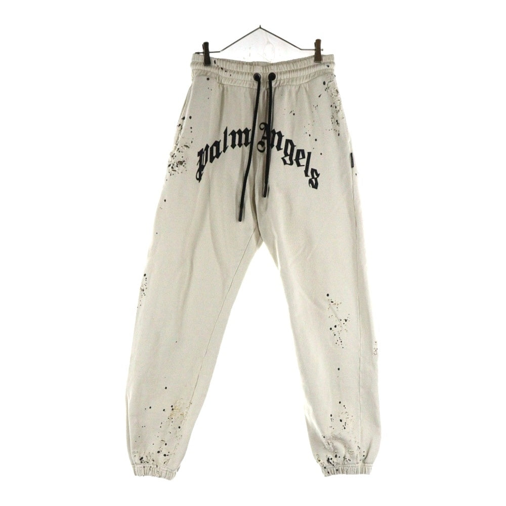 Palm Angels(パームエンジェルス) 25AW GLITTERED LOGO SWET PANTS グリッターロゴ ダメージ加工 スウェットパンツ アイボリー PMCH011F22FLE003