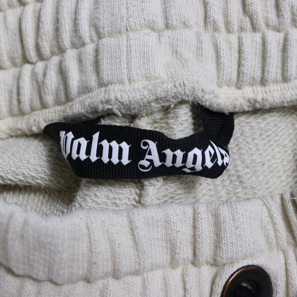 Palm Angels(パームエンジェルス) 25AW GLITTERED LOGO SWET PANTS グリッターロゴ ダメージ加工 スウェットパンツ アイボリー PMCH011F22FLE003