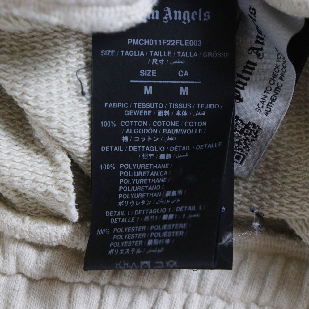 Palm Angels(パームエンジェルス) 25AW GLITTERED LOGO SWET PANTS グリッターロゴ ダメージ加工 スウェットパンツ アイボリー PMCH011F22FLE003