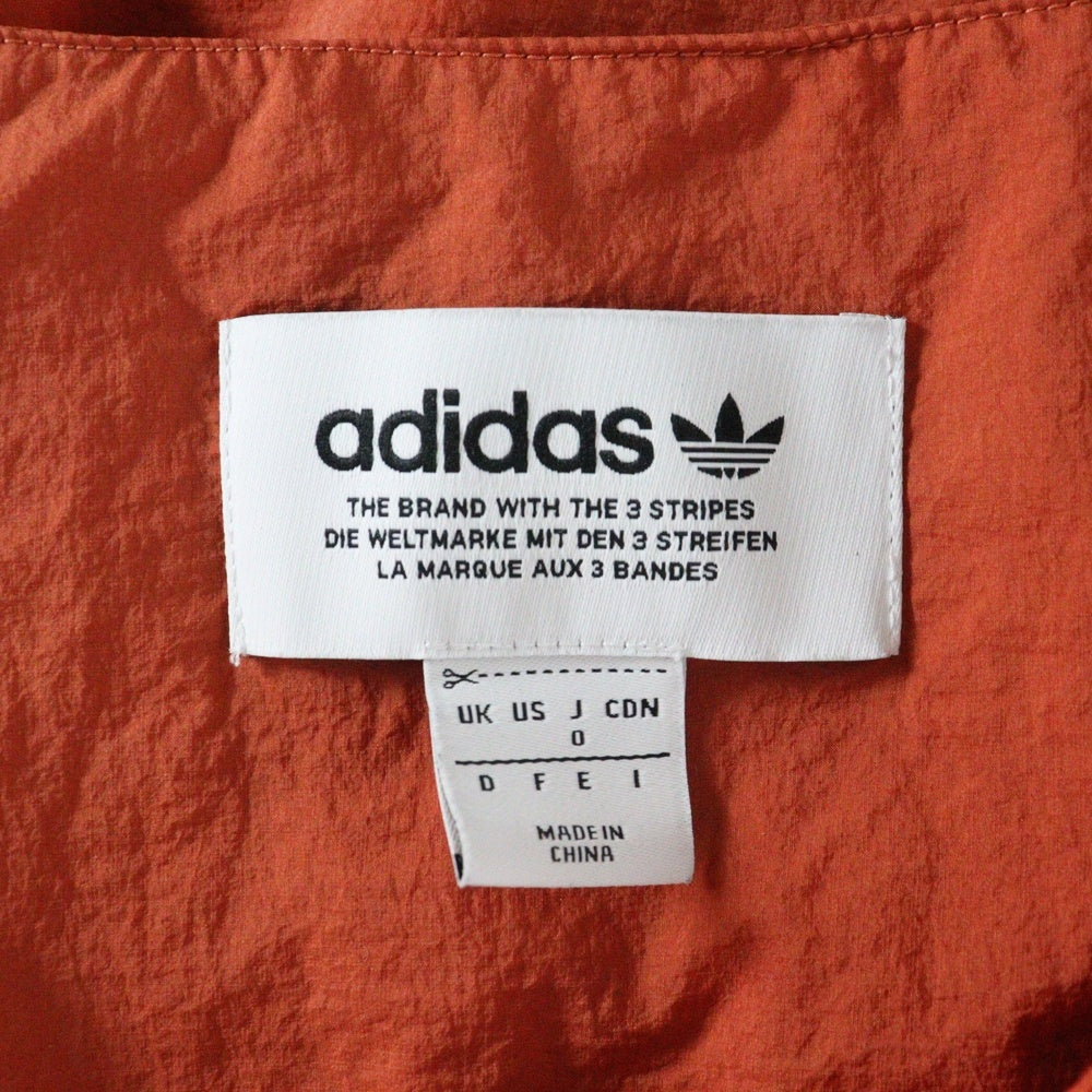 adidas(アディダス) ロゴパッチ付き ジップアップナイロンベスト オレンジ BS2474