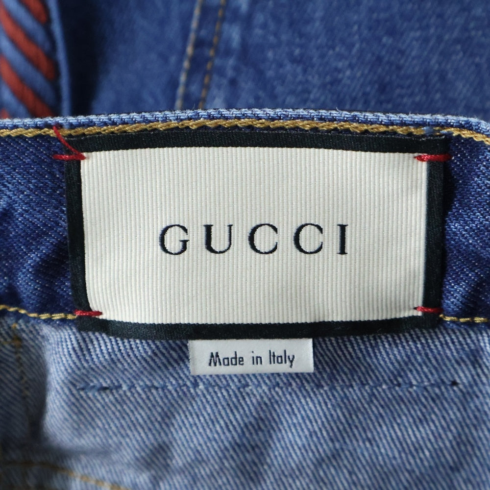 GUCCI(グッチ) ヴィンテージ加工 革パッチ サイドライン ジップアップ ストレートデニムパンツ インディゴ 561057