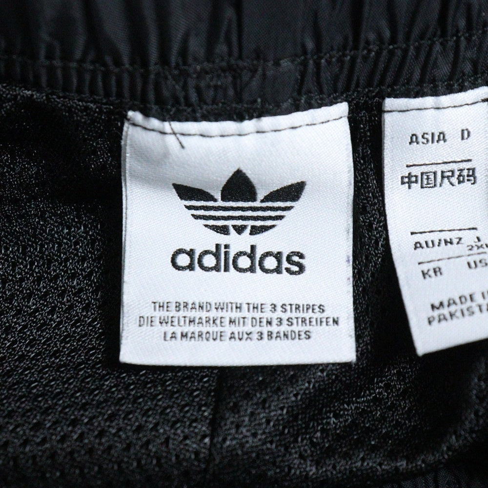 adidas(アディダス) NYLON PS PANT CLOWHI プレミアム エッセンシャルズ ナイロン パラシュートパンツ ホワイト IT6725