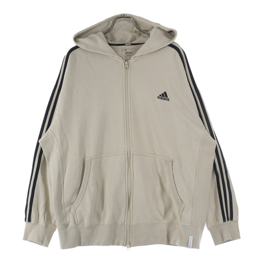 adidas(アディダス) エッセンシャルズ プラス ルーズフィット スリーストライプス フレンチテリー スウェット パーカー ベージュ JF3993