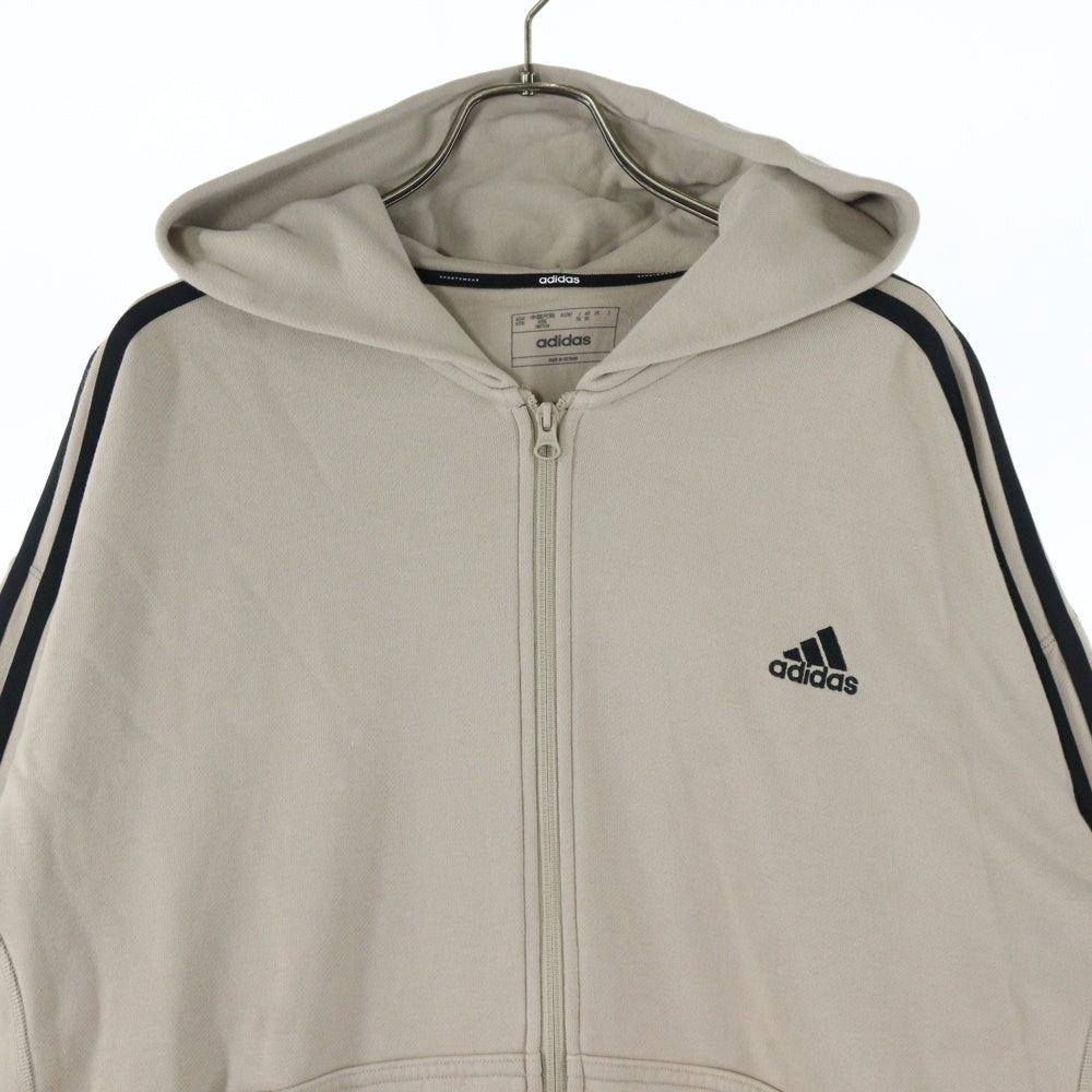 adidas(アディダス) エッセンシャルズ プラス ルーズフィット スリーストライプス フレンチテリー スウェット パーカー ベージュ JF3993