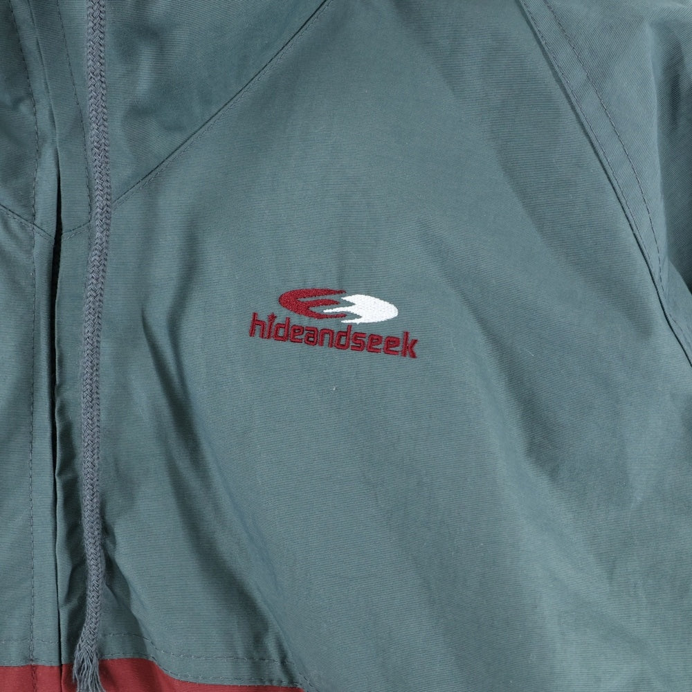 Hideandseek(ハイドアンドシーク) 23SS Nylon Zip Jacket ロゴ刺繍 バイカラーデザイン ナイロン ジップアップジャケット グレー/バーガンディ NJ-010123