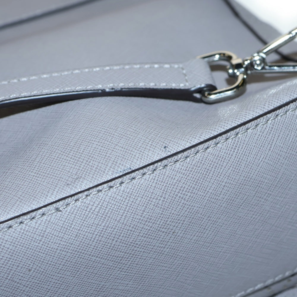 MICHAEL KORS(マイケルコース) ジオメトリックパターン レザー パンチング バッグパック レディース グレー 35H7SAYB1T