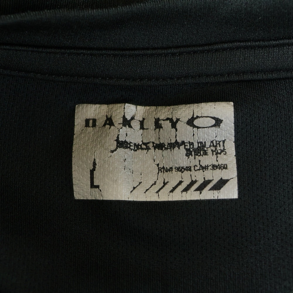 OAKLEY(オークリー) フロントロゴ フィットネス 長袖Tシャツ カットソー ブラック 454414JP