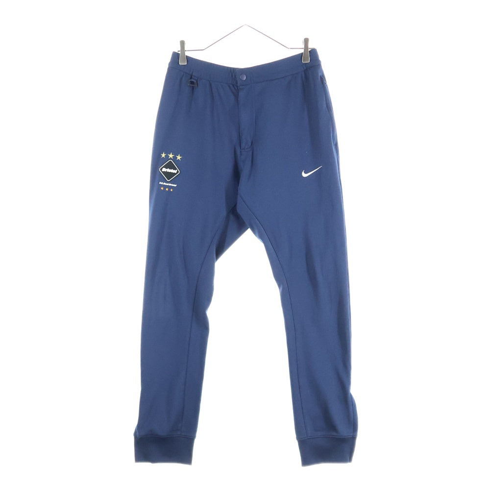 F.C.R.B./F.C.Real Bristol/FCRB(エフシーアールビー/エフシーレアルブリストル) ×NIKE DRI-FIT WARM UP PANTS ナイキ ドライフィット フロントロゴワッペン ウォームアップパンツ ネイビー 716118-450