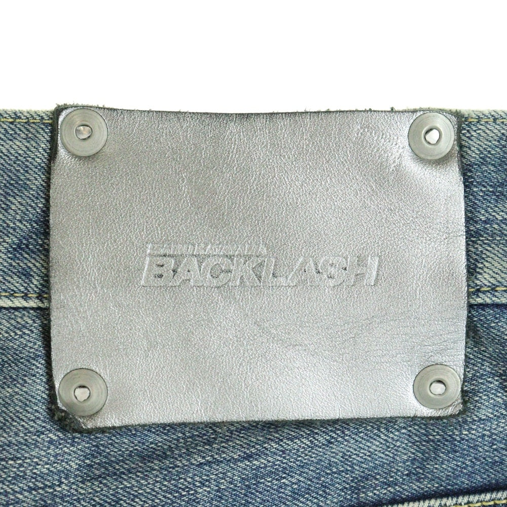 ISAMU KATAYAMA BACKLASH(イサムカタヤマバックラッシュ) 22AW 13oz STRETCH DENIM WILD BLUE YONDER FLARED レザーパッチ ボタンフライ フレアデニムパンツ インディゴ 2029-03