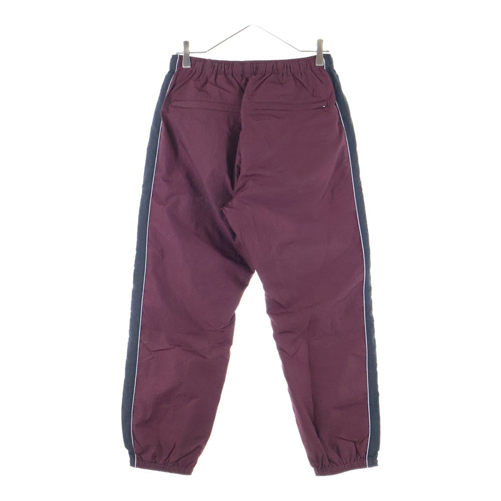 X-LARGE(エクストララージ) TRACK PANT サイドライン ドローストリング ナイロン トラックパンツ バーガンディー 01183606