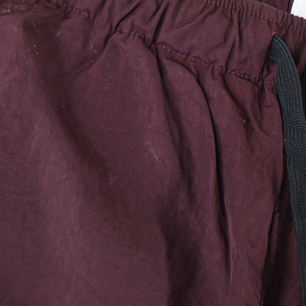 X-LARGE(エクストララージ) TRACK PANT サイドライン ドローストリング ナイロン トラックパンツ バーガンディー 01183606