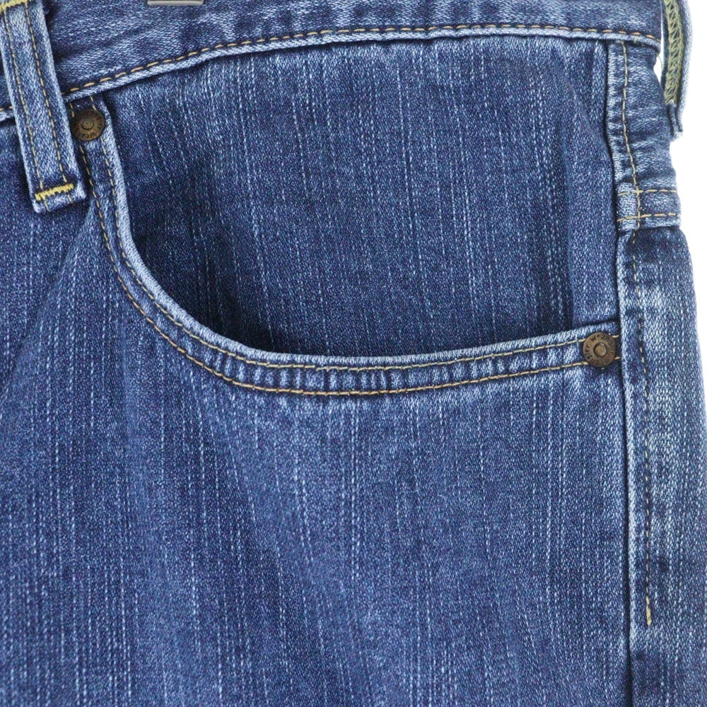 Wrangler(ラングラー) ブラウンロゴパッチ ボタンフライ ストレートデニムパンツ インディゴ W0383