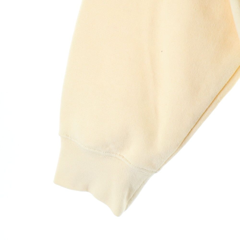 ESSENTIALS FEAR OF GOD(エッセンシャル フィアオブゴッド) バックロゴプリント プルオーバーパーカー アイボリー