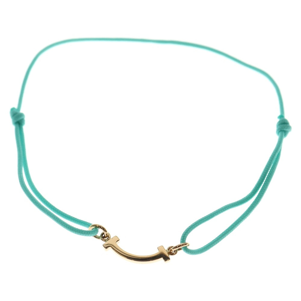 TIFFANY & Co.(ティファニー) K18 Tスマイル ミニ コードブレスレット ゴールド/ブルー Au750 レディース