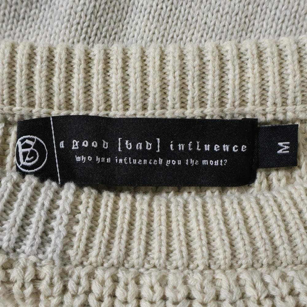 A GOOD BAD INFLUENCE(アグッドバッドインフレンス) クレイジーパターン バックロゴデザイン モックネック ニット セーター ベージュ
