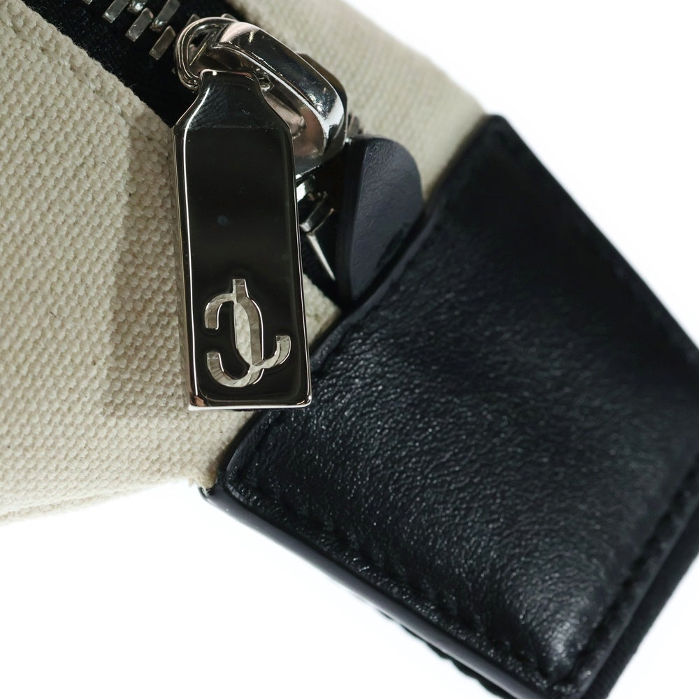 JIMMY CHOO(ジミーチュウ) FINSLEY フィンズリー フロントロゴ キャンバスボディバッグ アイボリー