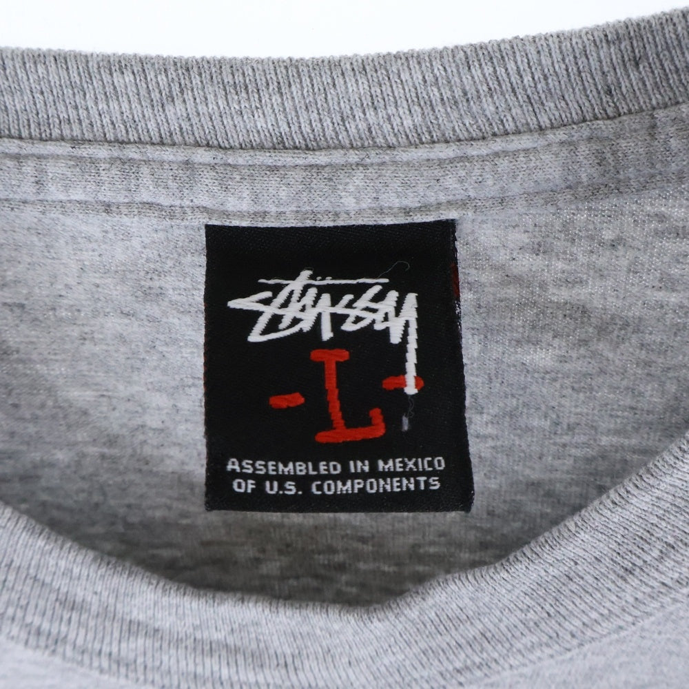 STUSSY(ステューシー) SKULL LOGO L/S TEE スカル フロントロゴプリントTシャツ メキシコ製 長袖クルーネックカットソー グレー