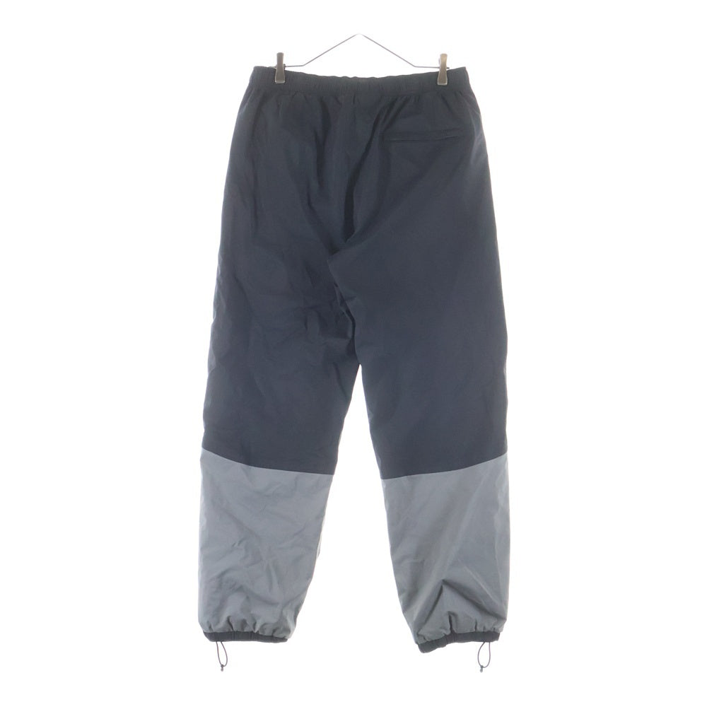 STUSSY(ステューシー) フロントロゴデザイン マルチポケット ドローストリング ナイロンパンツ ブラック