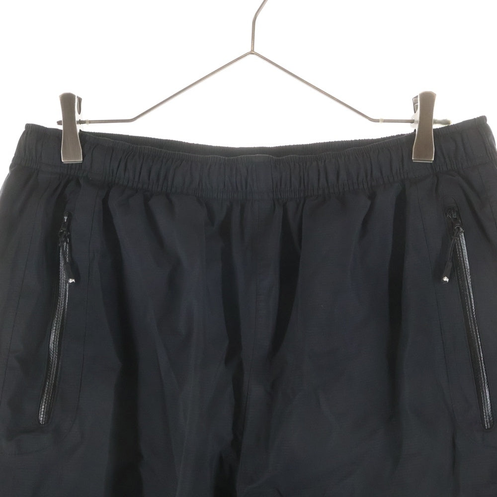 STUSSY(ステューシー) フロントロゴデザイン マルチポケット ドローストリング ナイロンパンツ ブラック