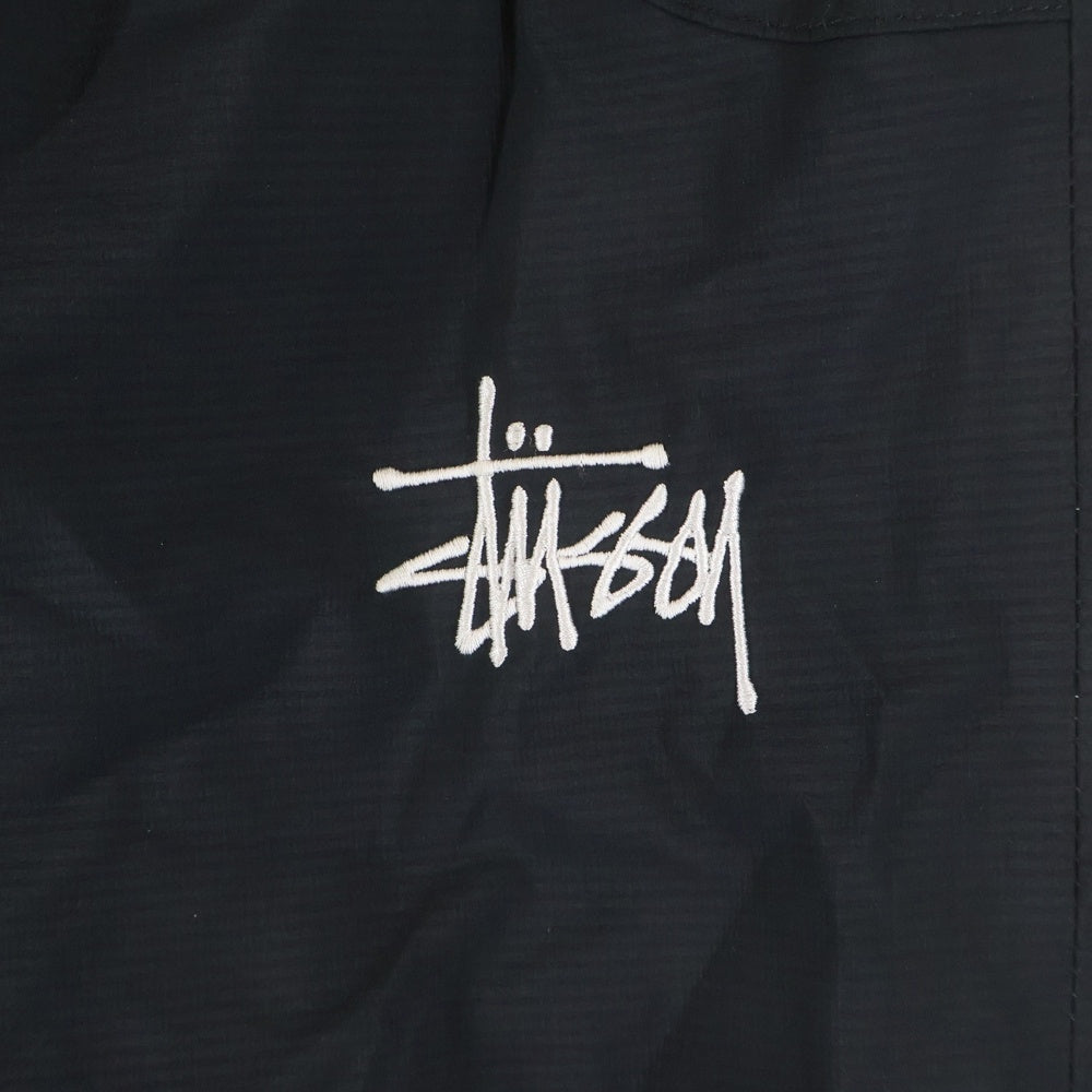STUSSY(ステューシー) フロントロゴデザイン マルチポケット ドローストリング ナイロンパンツ ブラック