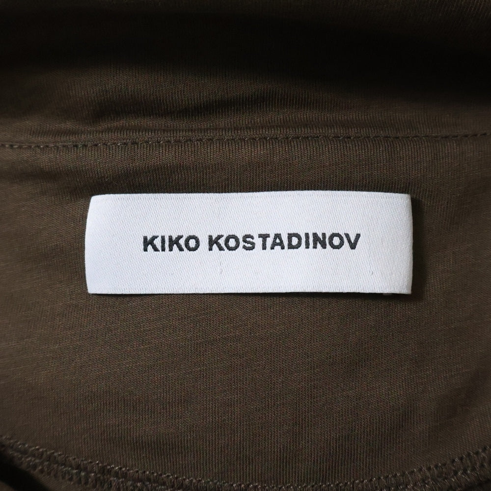 KIKO KOSTADINOV(キココスタディノフ) 25SS INEX HOODED TOP イネックス フーデッド トップ レイヤード 斜めボタン プルオーバーパーカー ブラック/ブラウン 00182025